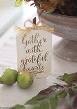 Load image into Gallery viewer, Bag of 9 Green Waterproof Pear Fruit Picks - 1.5" Wide
